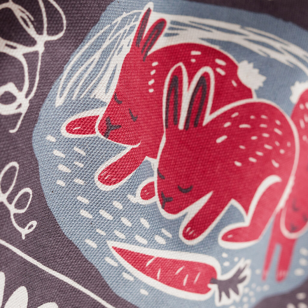 Winter burrows Christmas animal tea towel print by Matt Johnson